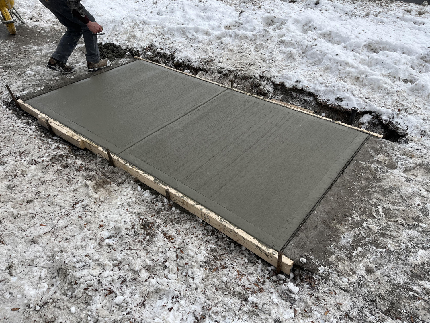 remove and replace of two concrete sidewalk panels
