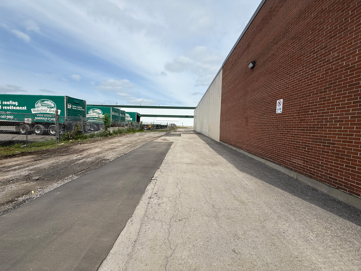 cut out and replace asphalt repair in a commercial parking lot